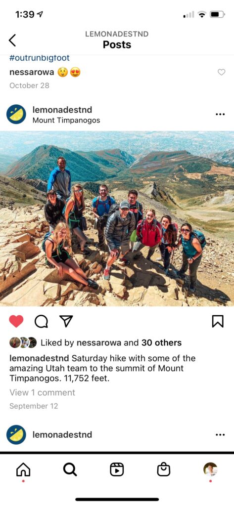 Lemonade Stand Instagram Post - Picture of Lemonade Stand Team on Hike "Saturday hike with some of the amazing Utah team to the summit of Mount Timpanogos. 11,752 feet."